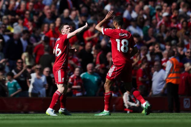 Liverpool, England, 25th April 2026. Andrew Robertson of Liverpool (L) celebrates scoring his team™s second goal with teammate Cody Gakpo during the Liverpool vs Crystal Palace Premier League match at Anfield, Liverpool. Picture credit should read: Jessica Hornby Sportimage EDITORIAL USE ONLY. No use with unauthorised audio, video, data, fixture lists, club league logos or live services. Online in-match use limited to 120 images, no video emulation. No use in betting, games or single club league player publications. SPI_038_JH_LIVERPOOL_CRYSTAL_PALACE SPI-4733-0038