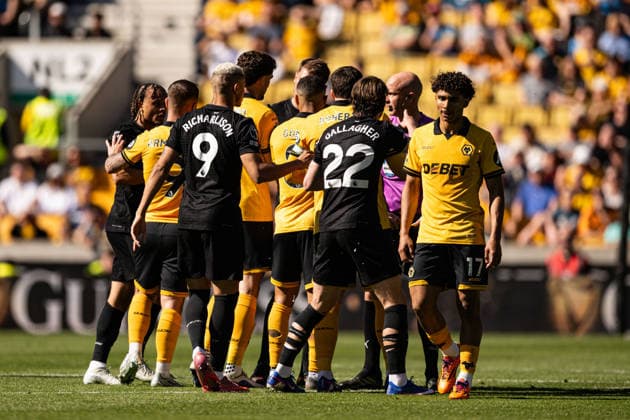 25th April 2026; Molineux Stadium, Wolverhampton, West Midlands, England; Premier League Football, Wolverhampton Wanderers versus Tottenham Hotspur; Tempers fray at Molineux after a challenge by Andre of Wolverhampton Wanderers on Yves Bissouma of Tottenham Hotspur and the players appeal to referee Anthony Taylor GodfreyxPitt