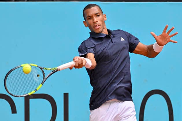 April 25, 2026, Madrid, Madrid, Spain: FELIX AUGER ALIASSIME of canada - ADIDAS during the Mutua Madrid Open 2026, ATP, Tennis Herren Masters 1000 and WTA, Tennis Damen 1000 tennis tournament, celebrated at Caja Magica on April 24, 2026 in Madrid, Spain. Mutua Madrid Open 2026 - Day 6 (04.25.26) - ZUMAc312 20260425_zsp_c312_256 Copyright: xOscarxManuelxSanchezx