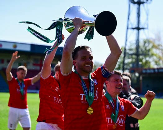 Rochdale v York City Enterprise National League York City s Callum Howe lifts the Enterprise National League trophy after the Enterprise National League match at Crown Oil Arena, Rochdale 25 04 2026 UK Newspapers OUT Copyright: xChrisxNuttonx FIL-23349-0021