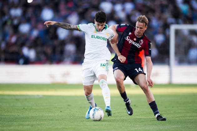 Bologna FC v AS Roma - Serie A Matias Soule of AS Roma competes for the ball with Torbjorn Heggem of Bologna FC during the Serie A football match between Bologna FC and AS Roma. Bologna Italy Copyright: xNicolòxCampox