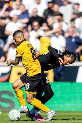 Wolverhampton Wanderers v Tottenham Hotspur, Premier League Tottenham Hotspur defender Djed Spence (24) battles for possession with Wolverhampton Wanderers midfielder Joao Gomes (8) during the Premier League match between Wolverhampton Wanderers and Tottenham Hotspur at Molineux, Wolverhampton, UK on 25 April 2026. Wolverhampton Molineux West Midlands UK Editorial use only DataCo restrictions apply See www.football-dataco.com , Copyright: xManjitxNarotrax PSI-24154-0047