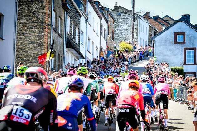The pack of riders pictured in action during the men elite race of the Liege-Bastogne-Liege UCI World Tour one day cycling race, 259,5km from Liege, over Bastogne to Liege, Sunday 26 April 2026. MAARTENxSTRAETEMANS  x172063101x