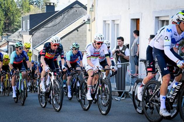 Belgian Tim Wellens of UAE Team Emirates-XRG and Slovenian Tadej Pogacar of UAE Team Emirates-XRG pictured in action during the men elite race of the Liege-Bastogne-Liege UCI World Tour one day cycling race, 259,5km from Liege, over Bastogne to Liege, Sunday 26 April 2026. MAARTENxSTRAETEMANS  x172063140x