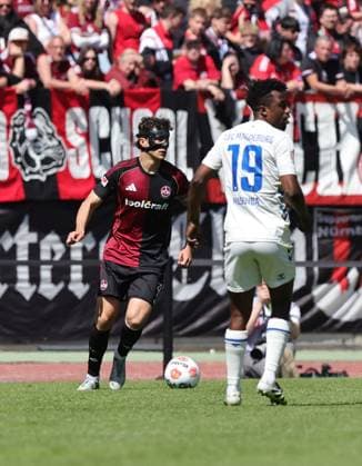 26 04 2026 Soccer Season 2025 2026 2 Soccer Bundesliga 31 Matchday 1 FC Nürnberg FCN Club 1 FC Magdeburg FCM Sportfoto Zink DaMa xdaxmax DFL regulations prohibit any use of photographs as image sequences and or quasi video only for editorial use Fabio Gruber 4, 1 FC Nürnberg FCN Lubambo Musonda 19, 1 FC Magdeburg FCM