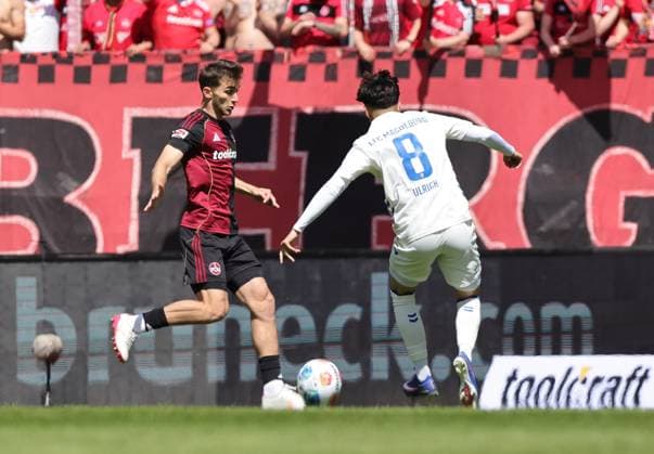 26 04 2026 Soccer Season 2025 2026 2 Soccer Bundesliga 31 Matchday 1 FC Nürnberg FCN Club 1 FC Magdeburg FCM Sportfoto Zink DaMa xdaxmax DFL regulations prohibit any use of photographs as image sequences and or quasi video only for editorial use Adam Markhiev 6, 1 FC Nürnberg FCN Laurin Ulrich 8, 1 FC Magdeburg FCM
