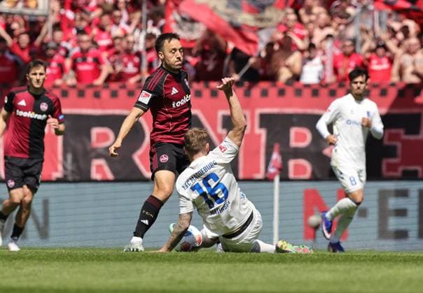26 04 2026 Soccer Season 2025 2026 2 Soccer Bundesliga 31 Matchday 1 FC Nürnberg FCN Club 1 FC Magdeburg FCM Sportfoto Zink DaMa xdaxmax DFL regulations prohibit any use of photographs as image sequences and or quasi video only for editorial use Julian Justvan 10, 1 FC Nürnberg FCN Marcus Mathisen 16, 1 FC Magdeburg FCM