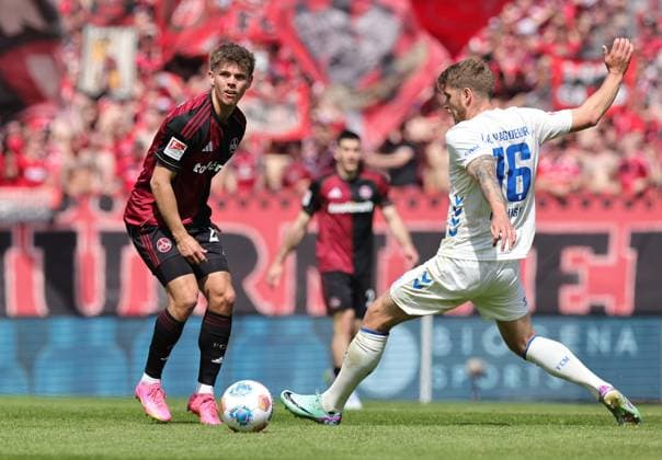 26 04 2026 Soccer Season 2025 2026 2 Soccer Bundesliga 31 Matchday 1 FC Nürnberg FCN Club 1 FC Magdeburg FCM Sportfoto Zink DaMa xdaxmax DFL regulations prohibit any use of photographs as image sequences and or quasi video only for editorial use Finn Ole Becker 25, 1 FC Nürnberg FCN Marcus Mathisen 16, 1 FC Magdeburg FCM
