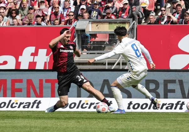 26 04 2026 Soccer Season 2025 2026 2 Soccer Bundesliga 31 Matchday 1 FC Nürnberg FCN Club 1 FC Magdeburg FCM Sportfoto Zink DaMa xdaxmax DFL regulations prohibit any use of photographs as image sequences and or quasi video only for editorial use Luka Lochoshvili 24, 1 FC Nürnberg FCN Laurin Ulrich 8, 1 FC Magdeburg FCM