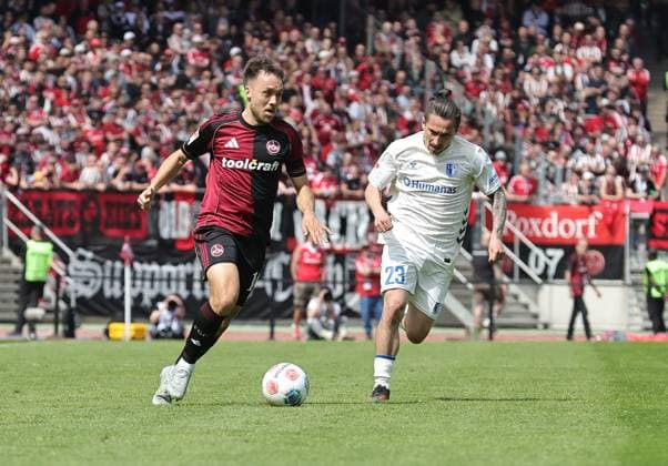 26 04 2026 Soccer Season 2025 2026 2 Soccer Bundesliga 31 Matchday 1 FC Nürnberg FCN Club 1 FC Magdeburg FCM Sportfoto Zink DaMa xdaxmax DFL regulations prohibit any use of photographs as image sequences and or quasi video only for editorial use Julian Justvan 10, 1 FC Nürnberg FCN Baris Atik 23, 1 FC Magdeburg FCM