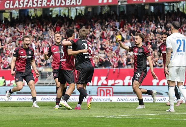 26 04 2026 Soccer Season 2025 2026 2 Soccer Bundesliga 31 Matchday 1 FC Nürnberg FCN Club 1 FC Magdeburg FCM Sportfoto Zink DaMa xdaxmax DFL regulations prohibit any use of photographs as image sequences and or quasi video only for editorial use Jubel Freude Torjubel nach Tor zum 1 0 Rafael Lubach 18, 1 FC Nürnberg FCN und Mannschaft Team jubelt freut sich Torschütze Rafael Lubach 18, 1 FC Nürnberg FCN