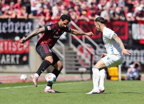 26 04 2026 Soccer Season 2025 2026 2 Soccer Bundesliga 31 Matchday 1 FC Nürnberg FCN Club 1 FC Magdeburg FCM Sportfoto Zink DaMa xdaxmax DFL regulations prohibit any use of photographs as image sequences and or quasi video only for editorial use Adriano Grimaldi 33, 1 FC Nürnberg FCN Falko Michel 21, 1 FC Magdeburg FCM