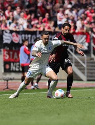 26 04 2026 Soccer Season 2025 2026 2 Soccer Bundesliga 31 Matchday 1 FC Nuremberg FCN Club 1 FC Magdeburg FCM Sportfoto Zink DaMa xdaxmax DFL regulations prohibit any use of photographs as image sequences and or quasi video only for editorial use Falko Michel 21, 1 FC Magdeburg FCM Adriano Grimaldi 33, 1 FC Nuremberg FCN