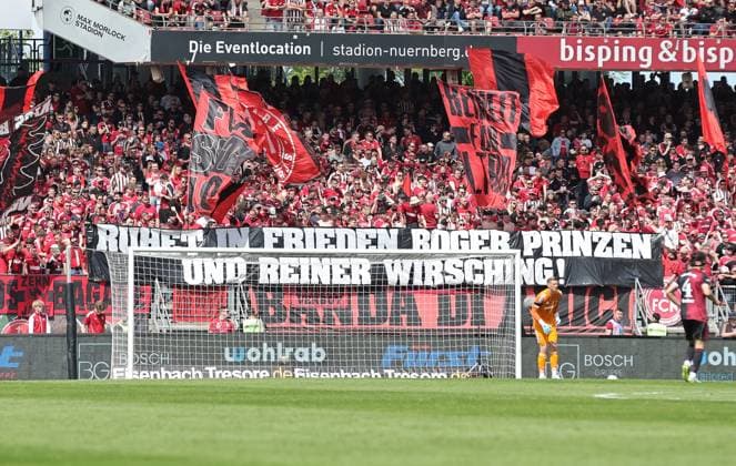 26 04 2026 Soccer Season 2025 2026 2 Soccer Bundesliga 31 Matchday 1 FC Nürnberg FCN Club 1 FC Magdeburg FCM Sportfoto Zink DaMa xdaxmax DFL regulations prohibit any use of photographs as image sequences and or quasi video only for editorial use Banner Banner of the Clubfan Clubfans FCN Fans Fans Rest in Peace Roger Prinzen and Reiner Wirsching