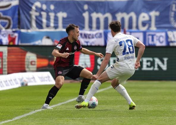 26 04 2026 Soccer Season 2025 2026 2 Soccer Bundesliga 31 Matchday 1 FC Nürnberg FCN Club 1 FC Magdeburg FCM Sportfoto Zink DaMa xdaxmax DFL regulations prohibit any use of photographs as image sequences and or quasi video only for editorial use Julian Justvan 10, 1 FC Nürnberg FCN Max Geschwill 28, 1 FC Magdeburg FCM