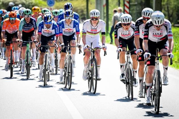 Belgian Remco Evenepoel of Red Bull-BORA-hansgrohe and Slovenian Tadej Pogacar of UAE Team Emirates-XRG pictured in action during the men elite race of the Liege-Bastogne-Liege UCI World Tour one day cycling race, 259,5km from Liege, over Bastogne to Liege, Sunday 26 April 2026. MAARTENxSTRAETEMANS  x172082300x