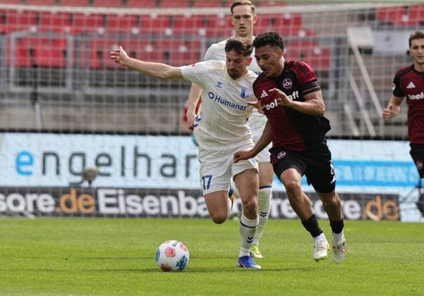 26 04 2026 Soccer Season 2025 2026 2 Soccer Bundesliga 31 Matchday 1 FC Nuremberg FCN Club 1 FC Magdeburg FCM Sportfoto Zink DaMa xdaxmax DFL regulations prohibit any use of photographs as image sequences and or quasi video only for editorial use Alexander Nollenberger 17, 1 FC Magdeburg FCM Henri Koudossou 8, 1 FC Nuremberg FCN