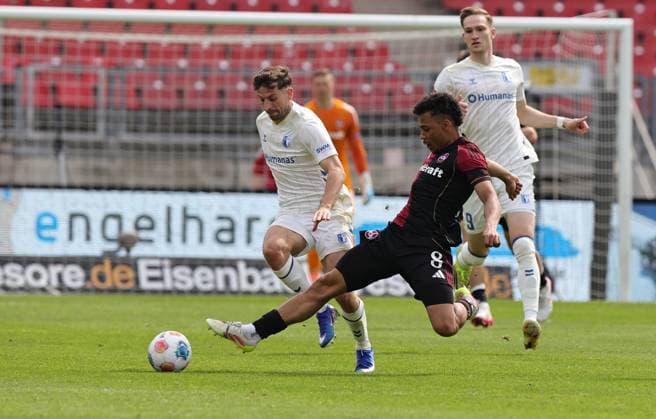 26 04 2026 Soccer Season 2025 2026 2 Soccer Bundesliga 31 Matchday 1 FC Nuremberg FCN Club 1 FC Magdeburg FCM Sportfoto Zink DaMa xdaxmax DFL regulations prohibit any use of photographs as image sequences and or quasi video only for editorial use Alexander Nollenberger 17, 1 FC Magdeburg FCM Henri Koudossou 8, 1 FC Nuremberg FCN