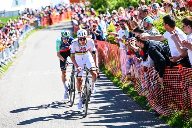 Liege Bastogne Liege 2026 Cycling Race LIEGE, BELGIUM - APRIL 26 : Seixas Paul (FRA) of Decathlon CMA CGM Team and Pogacar Tadej (SLO) of UAE Team Emirates XRG attacking during the 112th edition of Liege Bastogne Liege an UCI World Tour 1.UWT one day cycling road race for Men Elite of 260 km with start in Liege and finish in Liege on April 26, 2026 in Liege, Belgium, 26 04 2026 ( Motordriver Guy De Vuyst - Liege Belgium  Copyright: xVincentxKalutx