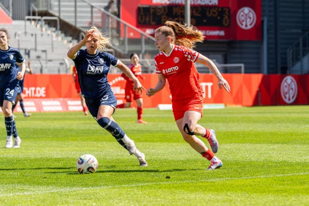 Match scene, duel, dribbling, offensive action, f l Anna Moczarski VfL Bochum, 10 , Maja Pageler 1 FSV Mainz 05, 37 , GER, 1 FSV Mainz 05 vs VfL Bochum, Football, 2 Womens Bundesliga, Matchday 23, Season 2025 2026, 26 04 2026, DFB REGULATES PROHIBIT ANY USE OF PHOTOGRAPHS AS IMAGE SEQUENCES AND OR QUASI VIDEO, GER, 1 FSV Mainz 05 vs VfL Bochum, Football, 2 Womens Bundesliga, Matchday 23, Season 2025 2026, 26 04 2026 Mainz Copyright: xEibner-Pressefoto Jan-NiclasxGrox EP_JGG