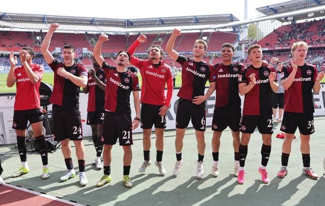 26 04 2026 Soccer Season 2025 2026 2 Soccer Bundesliga 31 Matchday 1 FC Nürnberg FCN Club 1 FC Magdeburg FCM Sportfoto Zink DaMa xdaxmax DFL regulations prohibit any use of photographs as image sequences and or quasi video only for editorial use Jubel Freude nach Spielende Mannschaft Team des FCN feiert singt mit Clubfan Clubfans FCN Fans Fans Fans celebrates with Clubfan Clubfans FCN Fans Fans Luka Lochoshvili 24, 1 FC Nürnberg FCN Berkay Yilmaz 21, 1 FC Nürnberg FCN Rafael Lubach 18, 1 FC Nürnberg FCN Adam Markhiev 6, 1 FC Nürnberg FCN Henri Koudossou 8, 1 FC Nürnberg FCN Finn Ole Becker 25, 1 FC Nürnberg FCN Piet Scobel 39, 1 FC Nürnberg FCN