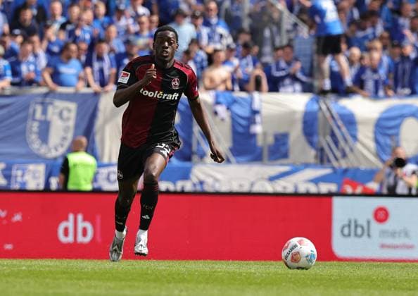 26 04 2026 Soccer Season 2025 2026 2 Soccer Bundesliga 31 Matchday 1 FC Nürnberg FCN Club 1 FC Magdeburg FCM Sportfoto Zink DaMa xdaxmax DFL regulations prohibit any use of photographs as image sequences and or quasi video only for editorial use Rabby Nzingoula 22, 1 FC Nürnberg FCN with special soccer shoes in design clipping single image