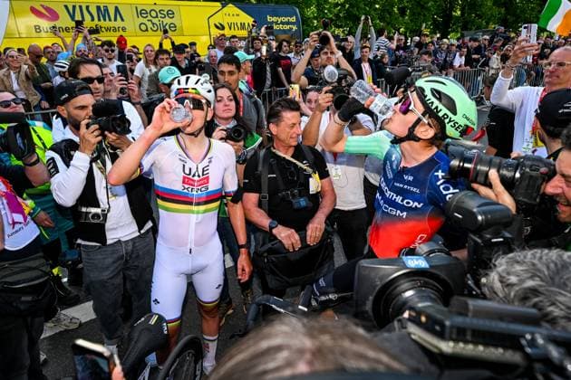 Slovenian Tadej Pogacar of UAE Team Emirates-XRG and French Paul Seixas of Decathlon CMA CGM Team celebrate after winning the men elite race of the Liege-Bastogne-Liege UCI World Tour one day cycling race, 259,5km from Liege, over Bastogne to Liege, Sunday 26 April 2026. MAARTENxSTRAETEMANS  x172087164x