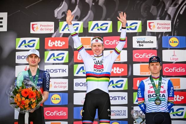 French Paul Seixas of Decathlon CMA CGM Team, Slovenian Tadej Pogacar of UAE Team Emirates-XRG and Belgian Remco Evenepoel of Red Bull-BORA-hansgrohe pictured on the podium after the men elite race of the Liege-Bastogne-Liege UCI World Tour one day cycling race, 259,5km from Liege, over Bastogne to Liege, Sunday 26 April 2026. MAARTENxSTRAETEMANS  x172091134x