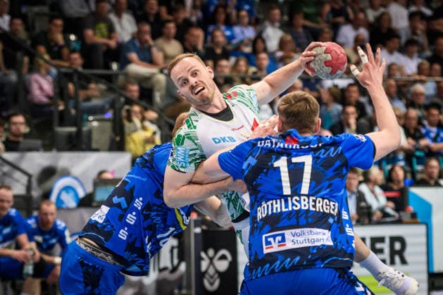 Omar Ingi Magnusson SC Magdeburg 14 vs Samuel Roethlisberger TVB Stuttgart, 17 and hidden Linus Schmid TVB Stuttgart, 18 GER, TVB Stuttgart SC Magdeburg, DAIKIN HBL, Handball, Bundesliga, Matchday 29, Season 2025 2026, 26 04 2026 GER, TVB Stuttgart SC Magdeburg, DAIKIN HBL, Handball, Bundesliga, Matchday 29, Season 2025 2026, 26 04 2026 Stuttgart Copyright: xSandyxDinkelackerx EP_SDR