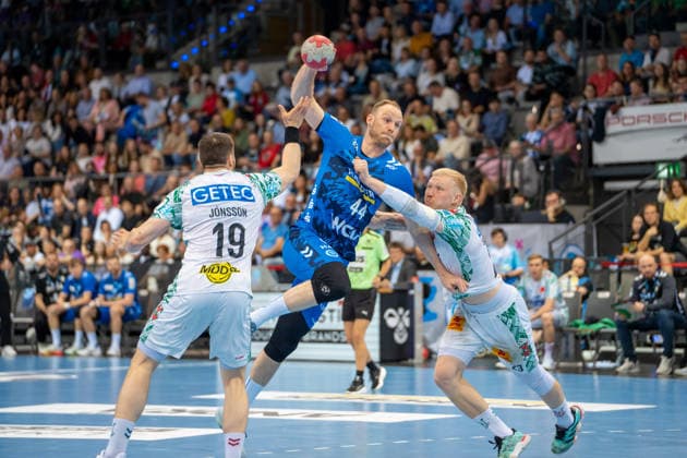 Handball I Men I Season 2025 2026 I Bundesliga I 29 Matchday I TVB Stuttgart SC Magdeburg I 26 04 2026 Lenny Rubin 44, TVB Stuttgart defended by Magnus Saugstrup 23, SC Magdeburg and Elvar Örn Jonsson 19, SC Magdeburg Stuttgart Porsche Arena Baden Württemberg Germany Copyright: xLobeca MaxxPetershansx