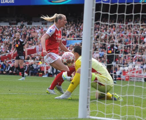 Football - 2025 2026 UEFA Women™s Champions League - Semi-Final, First Leg: Arsenal vs. OL Lyonnes - Emirates Stadium - Sunday 26th April 2026 Stina Blackstenius of Arsenal misses the ball, put put off Lyon goalkeeper enough too see the ball bobble into the net for Arsenal™s equalising goal 