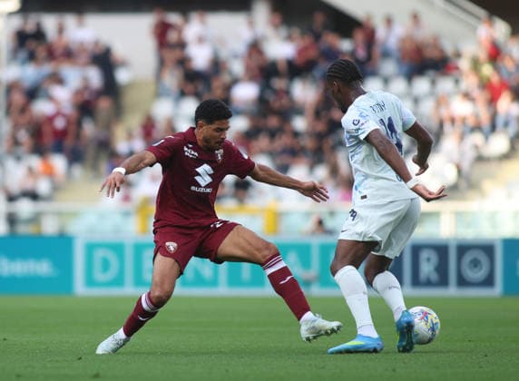 Saul Coco of Torino FC and Ange-Yoan Bonny of FC Inter during the Italian Serie A, football match between Torino FC and FC Inter Milan on 26 April 2026, at Stadio Olimpico Grande Torino, Turin, Italy. Photo Nderim Kaceli  Copyright: xNderimxKaceli IPAxSportx xipa-agency.netx xx IPA_74252870 IPA_Agency_IPA74252870