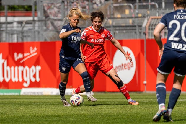 Game scene, dribbling, duel, f l Anna Moczarski VfL Bochum, 10 , Anna Donner 1 FSV Mainz 05, 15 , Amelie Foelsing VfL Bochum, 20 , GER, 1 FSV Mainz 05 vs VfL Bochum, Football, 2 Womens Bundesliga, 23 Matchday, Season 2025 2026, 26 04 2026, DFB REGULATES PROHIBIT ANY USE OF PHOTOGRAPHS AS IMAGE SEQUENCES AND OR QUASI VIDEO, GER, 1 FSV Mainz 05 vs VfL Bochum, Football, 2 Womens Bundesliga, Matchday 23, Season 2025 2026, 26 04 2026 Mainz Copyright: xEibner-Pressefoto Jan-NiclasxGrox EP_JGG