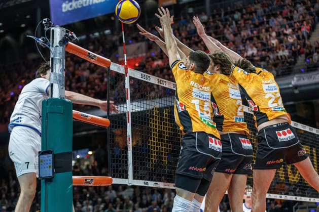 Volleyball, Men BR Volleys VfB Friedrichshafen, Bundesliga Moritz Reichert BR Volleys , Matthew Knigge BR Volleys and Jake Hanes BR Volleys block the ball BR Volleys VfB Friedrichshafen