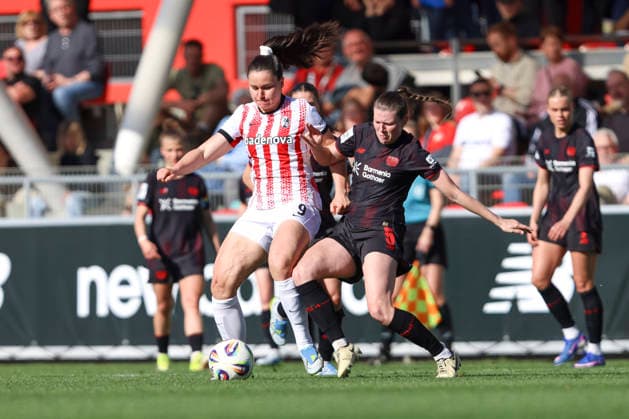 Svenja Fölmli SC Freiburg and Claudia Wenger Bayer 04 Leverkusen battle for the ball during the Woman Bundesliga match between Bayer 04 Leverkusen and SC Freiburg, Ulrich Haberland Stadion on April 26, 2026 in Leverkusen, Germany Photo by Oliver Kaelke DeFodi Images Svenja Fölmli SC Freiburg and Claudia Wenger Bayer 04 Leverkusen battle for the ball during the Woman Bundesliga match between Bayer 04 Leverkusen and SC Freiburg at Ulrich Haberland Stadion on April 26, 2026 in Leverkusen, Germany Photo by Oliver Kaelke DeFodi Images DFL regulations prohibit any use of photographs as image sequences and or quasi video Photo by Oliver Kaelke DeFodi Images