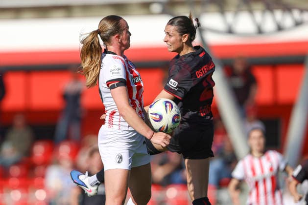 Luca Birkholz SC Freiburg and Selina Ostermeier Bayer 04 Leverkusen battle for the ball during the Woman Bundesliga match between Bayer 04 Leverkusen and SC Freiburg, Ulrich Haberland Stadion on April 26, 2026 in Leverkusen, Germany Photo by Oliver Kaelke DeFodi Images Luca Birkholz SC Freiburg and Selina Ostermeier Bayer 04 Leverkusen battle for the ball during the Woman Bundesliga match between Bayer 04 Leverkusen and SC Freiburg at Ulrich Haberland Stadion on April 26, 2026 in Leverkusen, Germany Photo by Oliver Kaelke DeFodi Images DFL regulations prohibit any use of photographs as image sequences and or quasi video Photo by Oliver Kaelke DeFodi Images