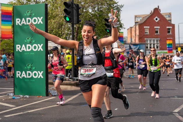 April 26, 2026, London, United Kingdom: runners of the London Marathon 2026 seen running mile 21 on Rainbow Row The London Marathon 2026..Mile 21 is named Rainbow Row for the day and sees a stage set up with lots of entertainment & Drag Artists. London Marathon 2026 Rainbow Row - Mile 21, In London, UK - 26 Apr 2026  - ZUMAs197 20260426_aaa_s197_541 Copyright: xBonniexBritainx