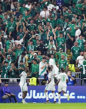 Football: ACLE Al Ahli s Feras Al Brikan (C, bottom) celebrates with teammates after opening the scoring in the first half of extra time during the Asian Champions League Elite final against Machida Zelvia in Jeddah, Saudi Arabia, on April 25, 2026.  A14AA0005480163P