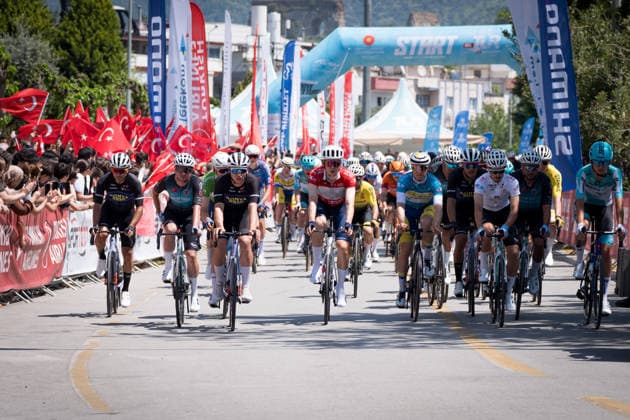 61st Presidential Cycling Tour of Turkiye AYDIN, TURKIYE - APRIL 27: Cyclists compete at the start of the second stage of the 61st Presidential Cycling Tour of Turkiye, a 152-kilometer route from Aydin to Marmaris, in Aydin, Turkiye, on April 27, 2026. Held under the auspices of the Turkish Presidency and supported by the Turkish Youth and Sports Ministry, the eight-stage race is Turkiye’s only event in the ‘ProSeries’ category on the UCI Europe Tour calendar. Ahmet Serdar Eser Anadolu Aydin Turkey. Editorial use only. Please get in touch for any other usage.  Copyright: x2026xAnadoluxAhmetxSerdarxEserx