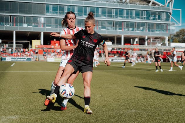 26.04.26, Women, Football, Google Pixel Frauen Bundesliga, Season 2025 2026, Bayer 04 Leverkusen - SC Freiburg, Matchday 23 Kristin Koegel ( 11 - Bayer 04 Leverkusen) in a dribbling against Greta Stegemann ( 16 - SC Freiburg) Leverkusen Ulrich-Haberland-Stadion NRW Deutschland