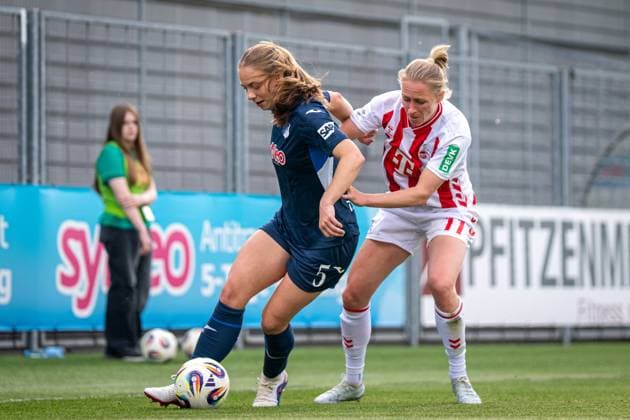 Jamilla Rankin 5 TSG Hoffenheim in a duel with Pauline Bremer 11 1 FC Köln at Dietmar Hopp Stadium GPFBL TSG Hoffenheim 1 FC Köln, 27 04 2026 Copyright: xSpeedshotx