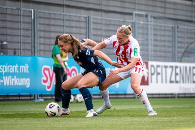 Jamilla Rankin 5 TSG Hoffenheim in a duel with Pauline Bremer 11 1 FC Köln at Dietmar Hopp Stadium GPFBL TSG Hoffenheim 1 FC Köln, 27 04 2026 Copyright: xSpeedshotx