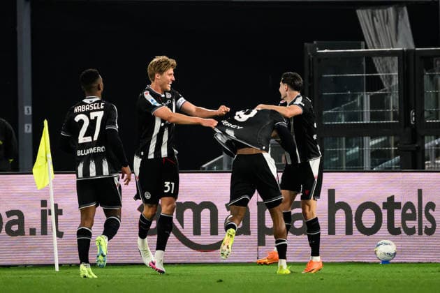 Kingsley Ehizibue of Udinese Calcio (2r) celebrates with team mates after scoring the goal of 0-1 during the Serie A 2025 2026 football match between SS Lazio and Udinese Calcio at Stadio Olimpico in Rome (Italy), April 27, 2026. AndreaxStaccioli