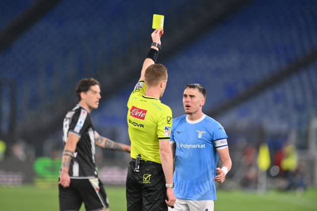 referee Kevin Bonacina issues a yellow card to Patric of SS Lazio during the match of 34th day of the Serie A Championship between S.S.Lazio and Udinese at the Olimpico Stadium on Apr 27, 2026 in Rome, Italy. during SS Lazio vs Udinese Calcio, Italian soccer Serie A match in Rome, Italy, April 27 2026  Copyright: xRobertoxRamaccia IPAxSportx xipa-agency.netx xx IPA_74280957 IPA_Agency_IPA74280957