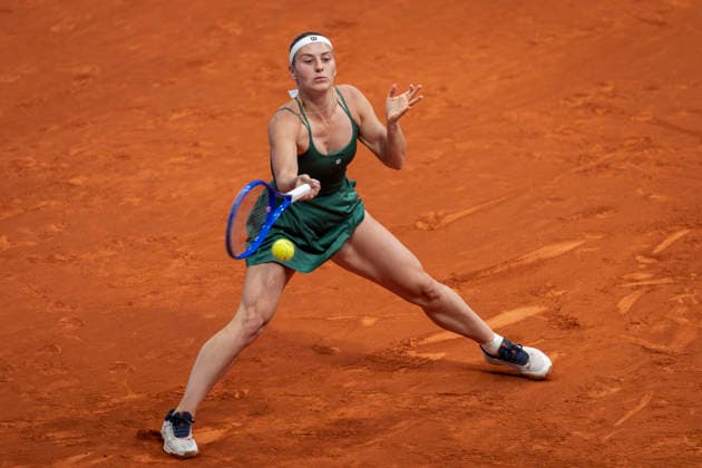 Mutua Madrid Open - Day Eight MADRID, SPAIN - APRIL 27: Marta Kostyuk of Ukraine plays a forehand against Caty McNally of United States during the Women s Singles Fourth Round during the Mutua Madrid Open 2026 tournament celebrated at La Caja Magica on April 27, 2026 in Madrid, Spain. Madrid La Caja Magica Madrid Spain Copyright: xAlbertoxGardinx AGardin_20260427_Tennis_Madrid_Day8_0690