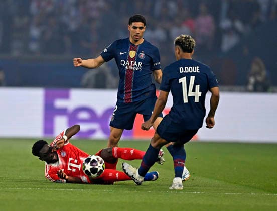 28 04 2026, Football UEFA Champions League 2025 2026 semi-final first leg, Paris St Germain FC Bayern Munich, at the Parc de Princes stadium in Paris France v l Alphonso Davies FC Bayern Munich vs Achraf Hakimi FC Paris Saint Germain and Desire Doue FC Paris Saint Germain DFL and DFB regulations prohibit any use of photographs as image sequences and or quasi video