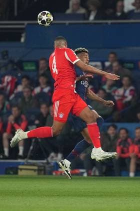 Jonathan Tah of Bayern Munich clears from Desire Doue of PSG Paris Saint-Germain v Bayern Munich, UEFA Champions League, Semi Final, First Leg, Football, Parc des Princes, Paris, France - 28 Apr 2026Paris Parc des Princes France EDITORIAL USE ONLY No use with unauthorised audio, video, data, fixture lists, club league logos or live services. Online in-match use limited to 120 images, no video emulation. No use in betting, games or single club league player publications. Copyright: xDavexWinter Shutterstockx 16847969z
