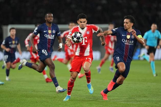 Luis Diaz of Bayern Munich takes on Marquinhos of PSG Paris Saint-Germain v Bayern Munich, UEFA Champions League, Semi Final, First Leg, Football, Parc des Princes, Paris, France - 28 Apr 2026Paris Parc des Princes France EDITORIAL USE ONLY No use with unauthorised audio, video, data, fixture lists, club league logos or live services. Online in-match use limited to 120 images, no video emulation. No use in betting, games or single club league player publications.  Copyright: xDavexWinter Shutterstockx 16847969dg