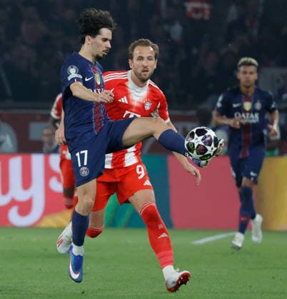 (260429) -- PARIS, April 29, 2026 -- PSG s Vitinha (L) vies with Bayern Munich s Harry Kane during the UEFA Champions League semi-final first leg football match between Paris Saint-Germain (PSG) and Bayern Munich at the Parc des Princes in Paris, France, April 28, 2026. (Photo by Xinhua) (SP)FRANCE-PARIS-FOOTBALL-UEFA CHAMPIONS LEAGUE-SEMI-FINAL-PSG VS BAYERN MUNICH HenrixSzwarc 