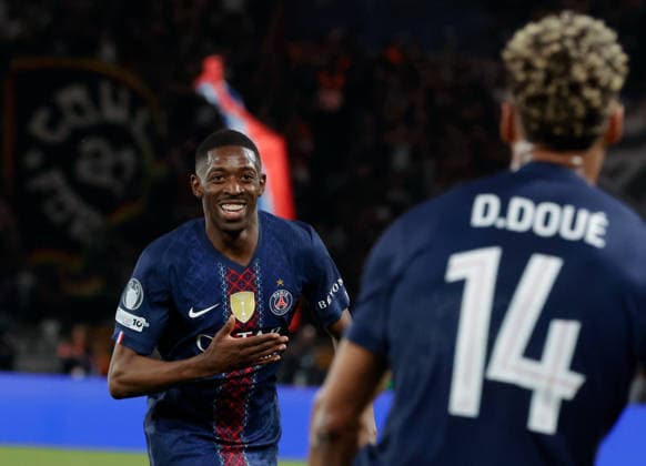 (260429) -- PARIS, April 29, 2026 -- PSG s Ousmane Dembele (L) celebrates with his teammate Desire Doue after scoring during the UEFA Champions League semi-final first leg football match between Paris Saint-Germain (PSG) and Bayern Munich at the Parc des Princes in Paris, France, April 28, 2026. (Photo by Xinhua) (SP)FRANCE-PARIS-FOOTBALL-UEFA CHAMPIONS LEAGUE-SEMI-FINAL-PSG VS BAYERN MUNICH HenrixSzwarc 